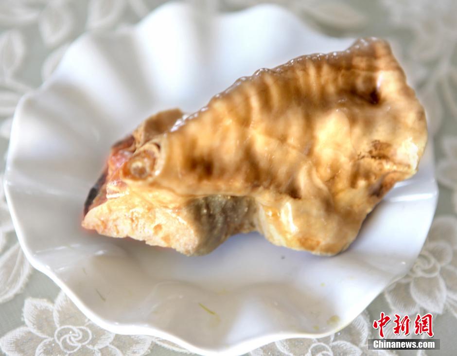 河南藏家擺“肉石宴”幾可亂真 河南藏家擺“肉石宴”幾可亂真